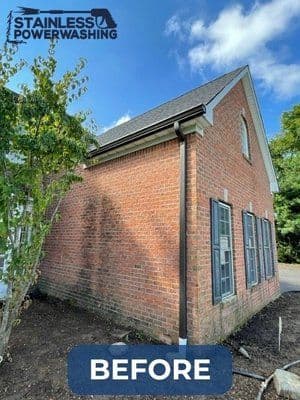 Before image of a brick house showing dirt and grime on the exterior. Power washing service preview.